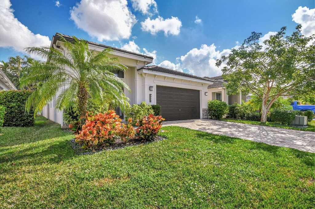 Photo of 7491 Moonrise Drive, Lake Worth, FL 33467 (MLS # R11063979)