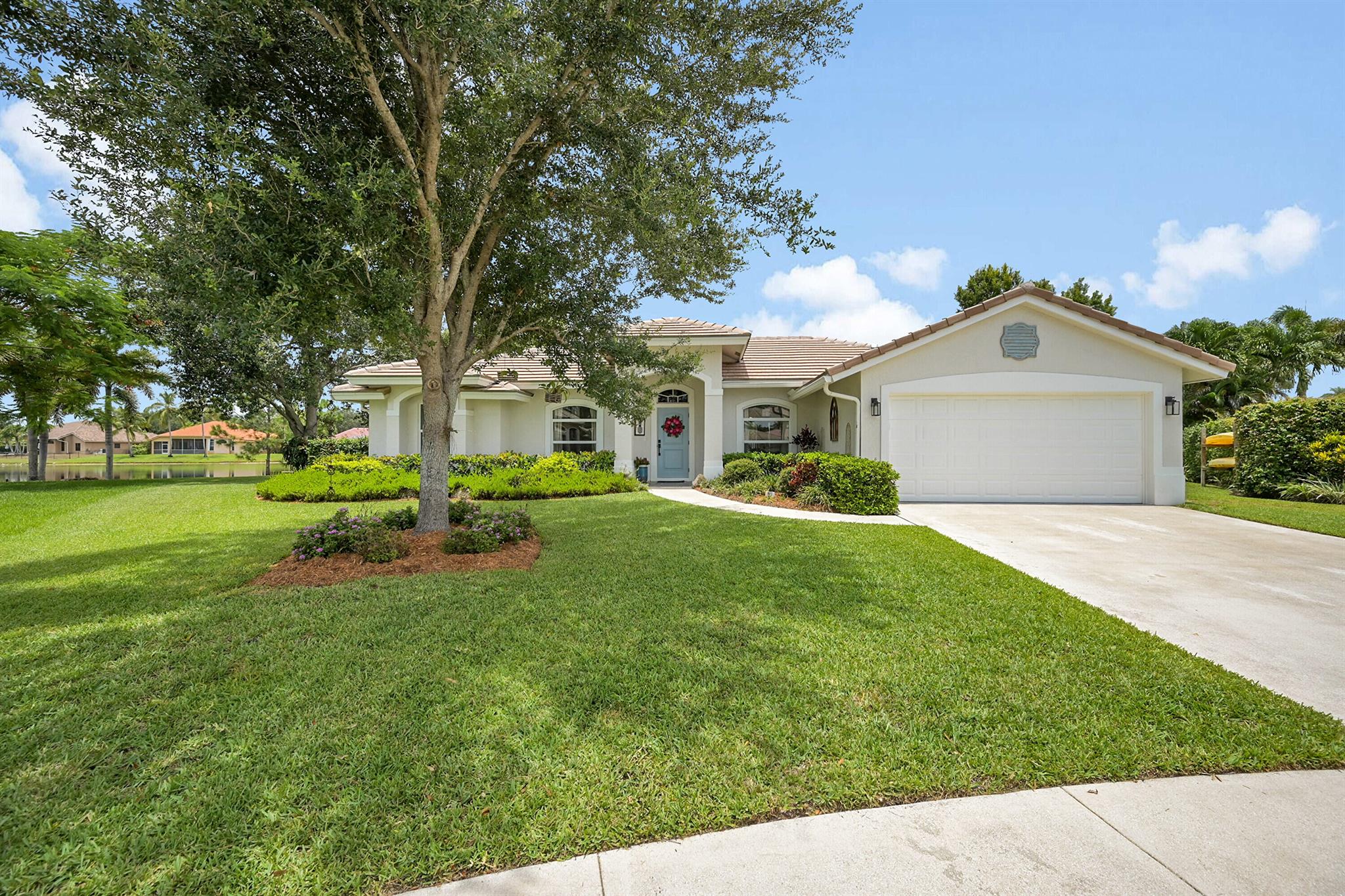 This beautifully remodeled and upgraded 3-bedroom, 2-bathroom waterfront pool home is ideally situated on a quiet cul-de-sac lot in the sought-after community of Crestwood. Enjoy peace of mind with a brand-new roof (2024) and hurricane impact windows throughout. Inside, you'll love the light and bright open layout featuring tile flooring throughout, vaulted ceilings, and arched walkways. The heart of the home is a custom-remodeled kitchen with granite countertops, white cabinetry, tile backsplash, and upgraded lighting - perfect for cooking and entertaining. Step outside to your private backyard oasis with a sparkling pool, covered patio, fenced area, and tranquil water views. Master bedrooms suite has been fully upgraded with new flooring, soaking tub, shower area, and new vanity.