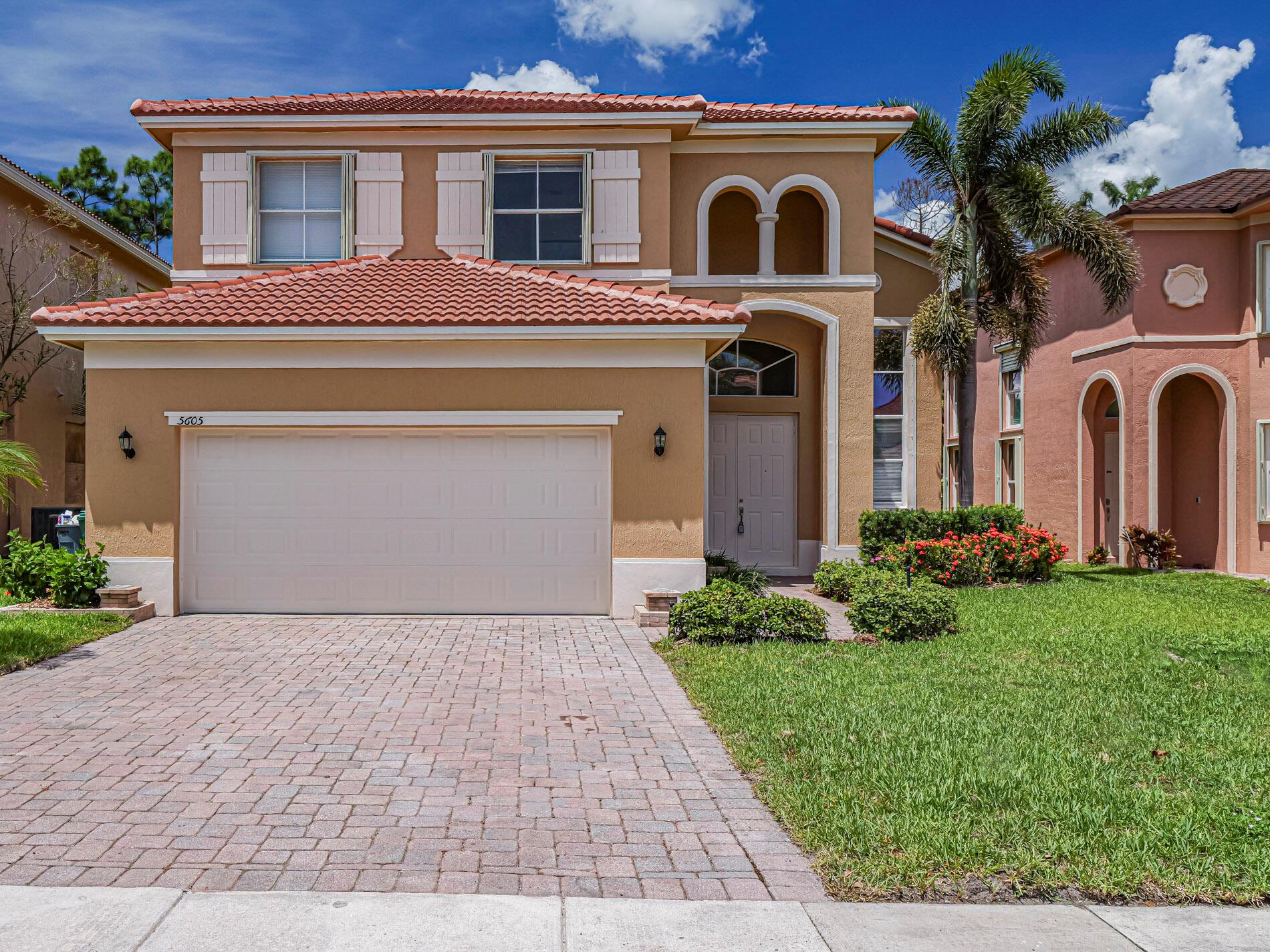 Newly renovated, absolutely spotless 5- bedroom, 3-bathroom home. This spacious two-story property offers bright and open living areas, a private garage, and a beautiful landscaped yard, all within a secure gated community featuring a pool and clubhouse. Easy access to both I95 and Florida' s turnpike. Just a few miles from the Atlantic Ocean.