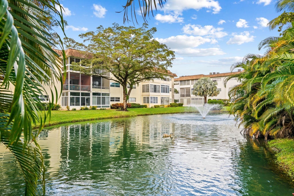 Photo of 5151 W Oakland Park Boulevard #309, Lauderdale Lakes, FL 33313 (MLS # B26037601)