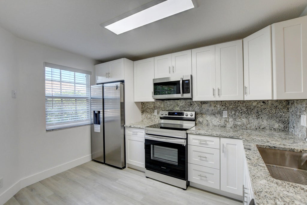 Photo of 6725 Via Regina, Boca Raton, FL 33433 (MLS # R11018160)