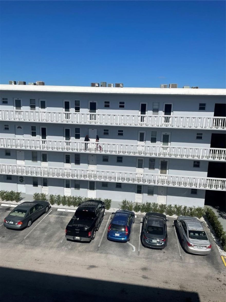 This property needs updating but it is well kept. Owner said make offer.   Tile in Kitchen, bathrooms and Halls.  Carpet throughout.  Sliding glass doors on the patio is excellent for the rainy days where you can have your morning coffee and enjoy the tranquility of the rain.  Great Corner unit near stairwell and your parking space is just below.  This unit is located approximately a mile to the beach.  Walking distance to Publix, Restaurants and Dania Casino.  Mins to I95 or 595 and the Fort Lauderdale Airport.