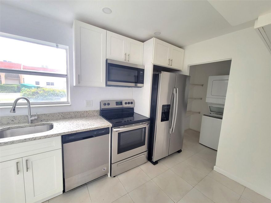 Experience serene lakefront living in this lovely and bright 1BR/1.5BA first-floor condo in the premier 55+ community of Golden Lakes Village. Featuring an open floor plan with peaceful garden and lake views, this unit includes a washer/dryer and a master suite with ample storage. Rent includes water and cable. No carpet, floor has tiles and laminate wood. The porch offers you a peaceful and relaxing space. Enjoy resort-style amenities: 24-hr guard-gated security, heated pools, spa, sauna, gym, and clubhouse. Perfectly located near PBI Airport, hospitals, shopping, and world-class beaches.