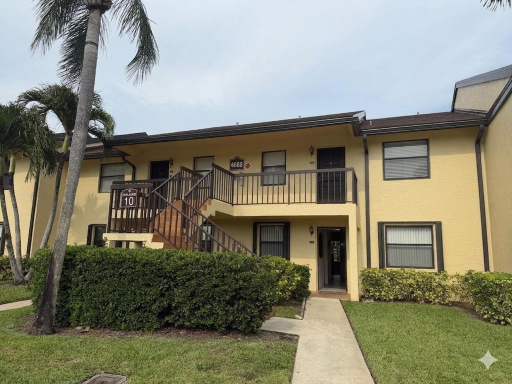 Photo of 4688 E Lucerne Lakes Blvd Boulevard E #104, Lake Worth, FL 33467 (MLS # B26029568)