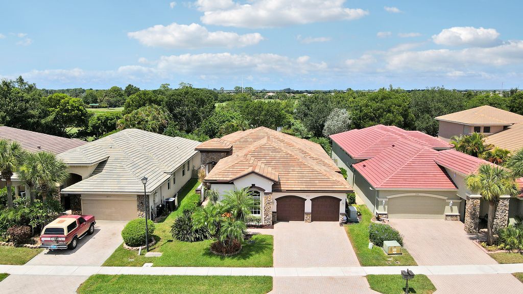 Photo of 9325 Osprey Isles Boulevard, Palm Beach Gardens, FL 33412 (MLS # R11118860)