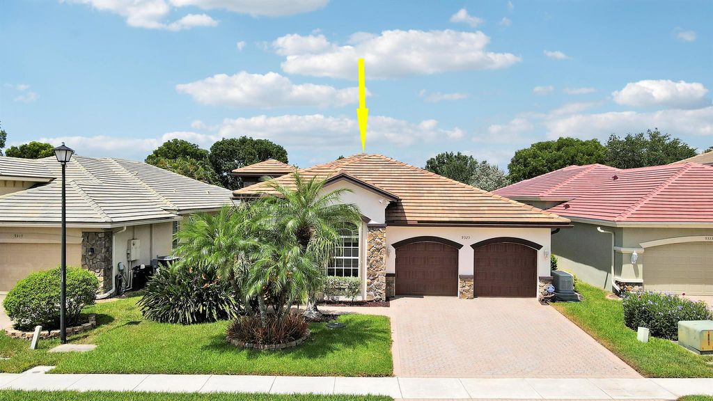 Photo of 9325 Osprey Isles Boulevard, Palm Beach Gardens, FL 33412 (MLS # R11118860)