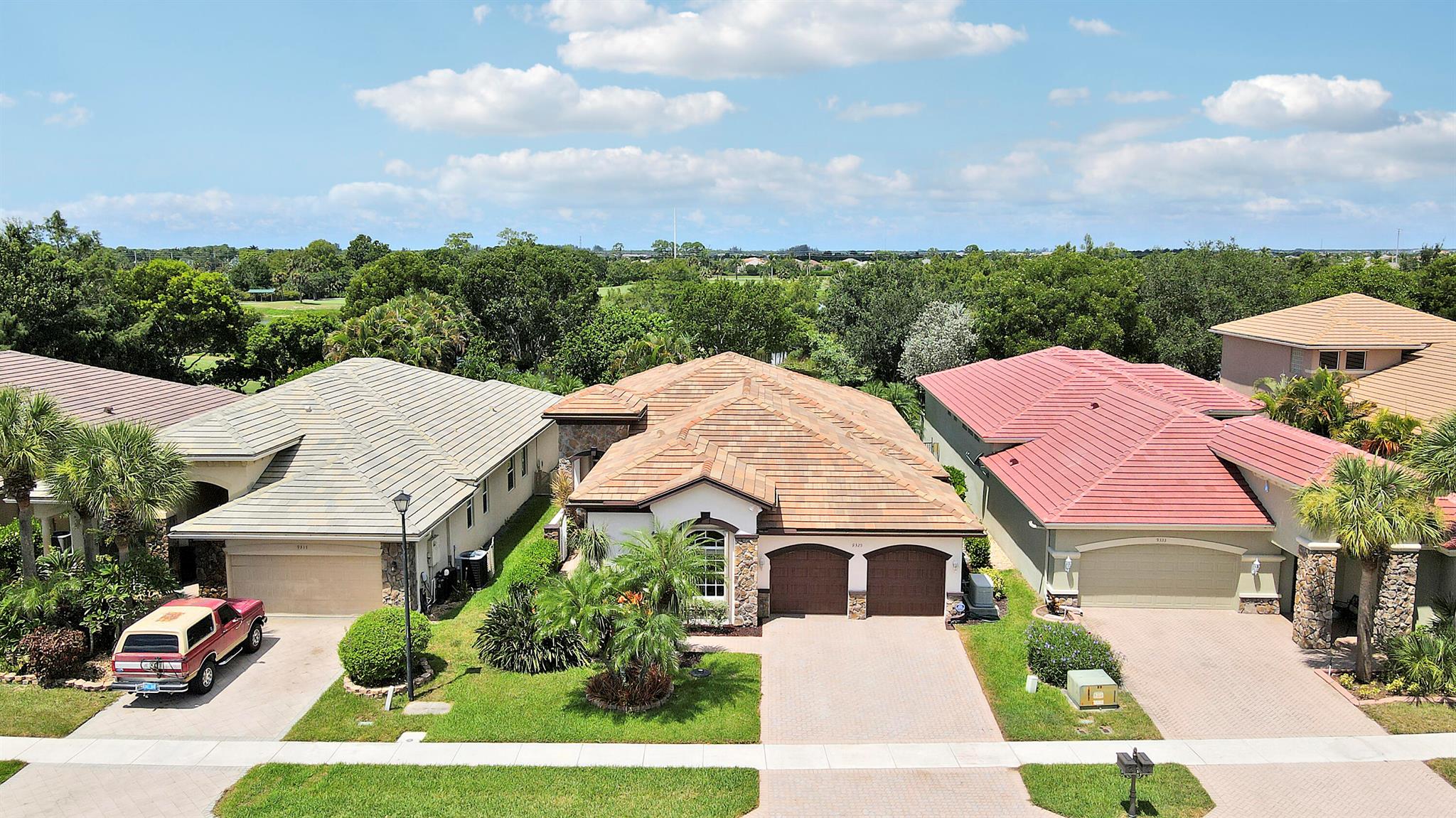 Serene, secure, postcard-worthy lake-and-fairway views--9325 Osprey Isles delivers resort living for real life. A 2018 roof and new A/Cs pair with a whole-home 22 kW generator (250-gal propane) for true peace of mind. Inside, the floor plan balances together time and quiet moments with a formal living room, separate family room, dedicated dining room, and a bar that serves the main living areas. Three bedrooms enjoy ensuite baths for easy hosting or multi-gen comfort. Step outside to a saltwater pool and spacious patio that take in sweeping golf and water vistas. Storm prep is effortless thanks to complete hurricane protection--impact glass with supplemental accordion shutters--and an ultra-quiet, hurricane-rated garage door. Immaculate, move-in ready, and waiting for you.