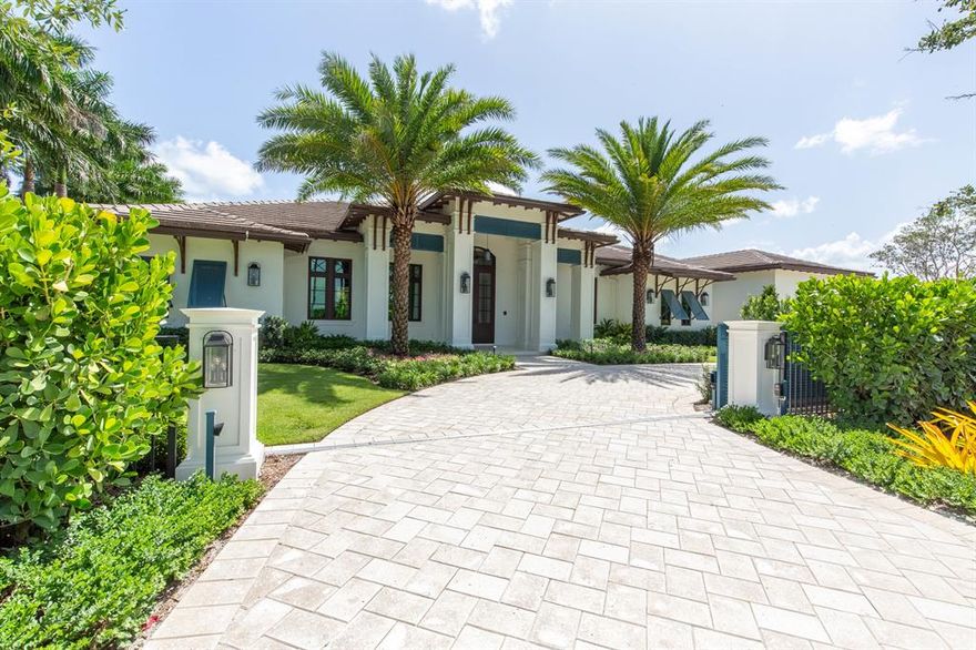 Exquisite new construction equestrian estate located in Mallet Hill, a highly coveted, guard-gated community offering a location just a half mile hack away from both the WEF and Global horse shows. This privately gated, luxurious property offers a 4 bedroom, 5 and a half bath main house, 2 bedroom, 1 bath caretakers' quarters, 8-stall stable, 200' x 100' arena, and 3 paddocks. The main residence encompasses over 5,000 square feet of living space and has been masterfully designed for a refined way of living. The lavish floor plan includes a private study, club room, multiple vestibules with morning bars, a striking dining room featuring a bar with dual wine refrigerators, and so much more.