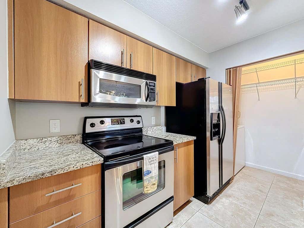 Photo of 1020 CRYSTAL Way #M, Delray Beach, FL 33444 (MLS # B26065787)