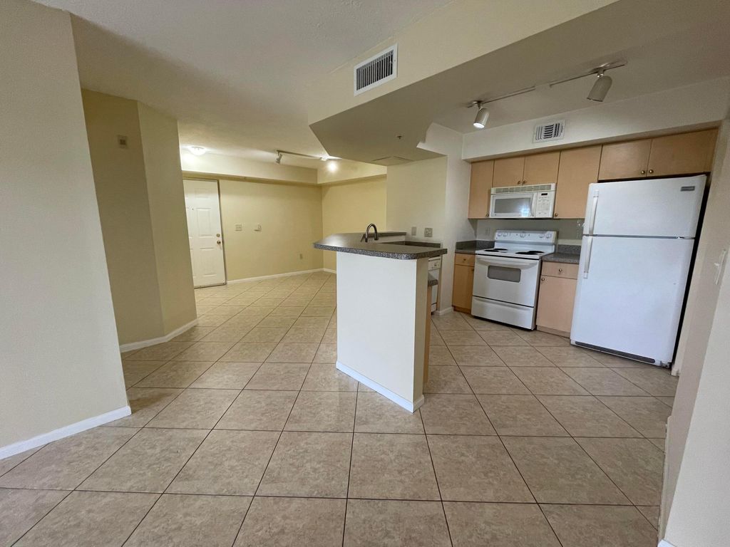 Photo of 3613 NW Mediterranean Lane #13-206, Jensen Beach, FL 34957 (MLS # R11054036)