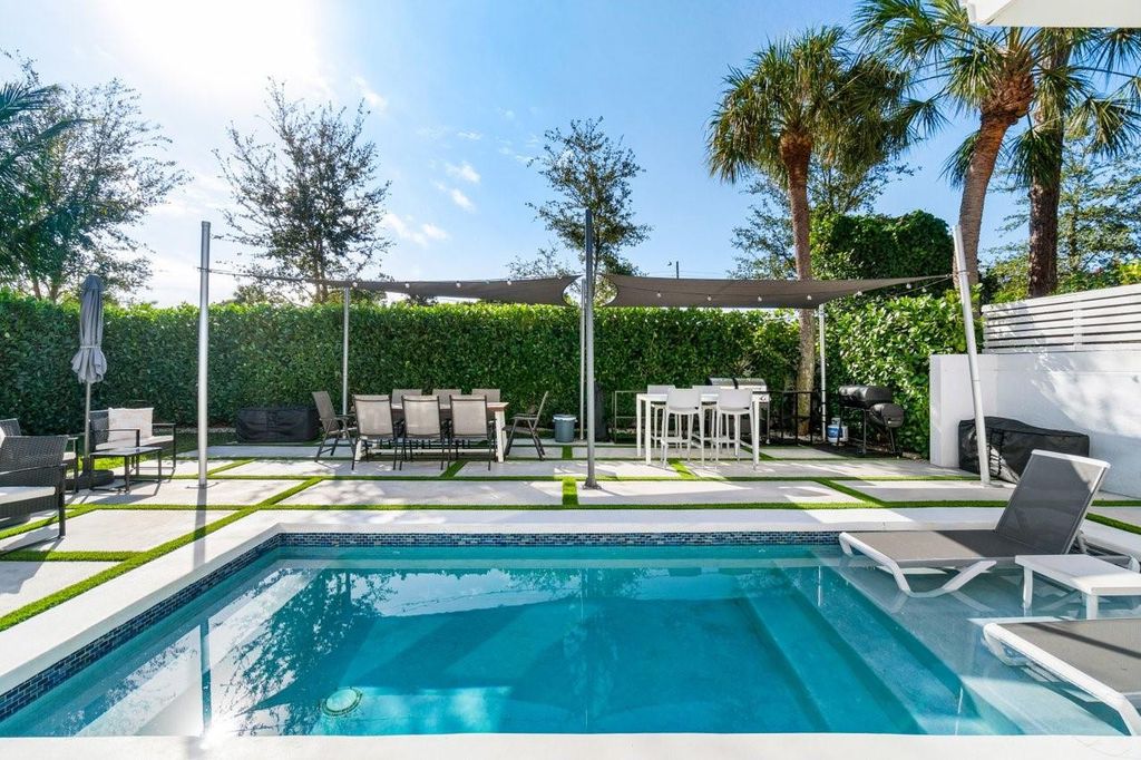 Photo of 2058 NW 52nd Street, Boca Raton, FL 33496 (MLS # B26028670)