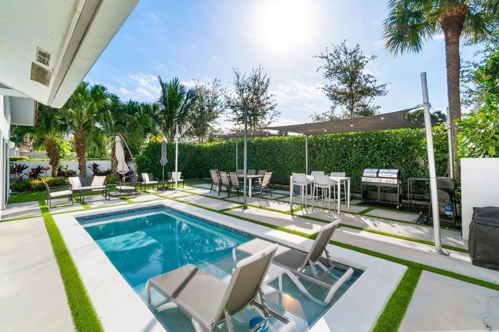 Photo of 2058 NW 52nd Street, Boca Raton, FL 33496 (MLS # B26028670)