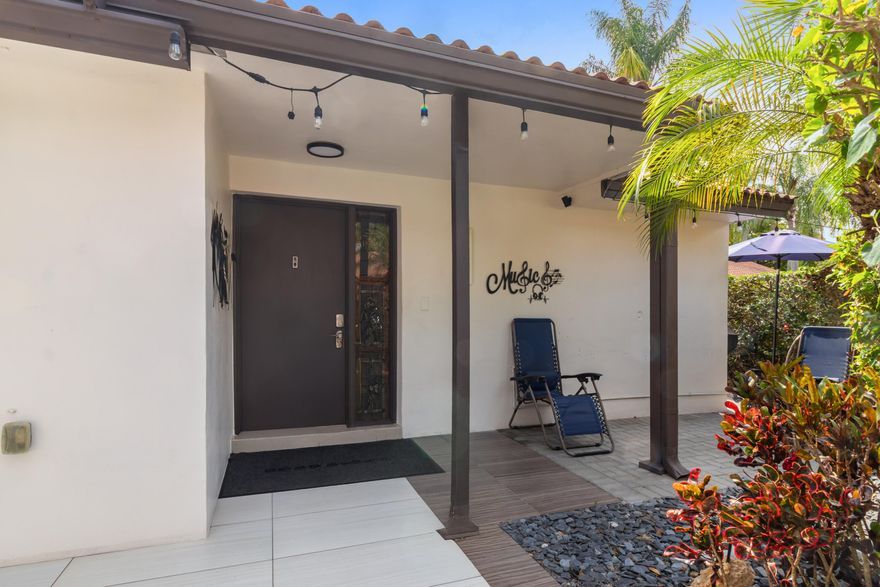 Great opportunity to own a beautifully renovated 2 bed, 2 bath villa his rarely available bright and spacious corner unit features a modern, open-concept floor plan perfect for contemporary living in a fantastic community! The home has updated floors, kitchen, and bathrooms. The converted garage perfect for guests, or a home office. Enjoy an open front porch, plus a deck area for BBQs and entertaining. The roof is covered by the association for added peace of mind. Amenities include Clubhouse, Community Pool, Basketball Court and pickleball court, ideally located within walking distance to shops and restaurants with easy access to major roads.  All Ages Welcome Community just off University Drive, close to HCA Hospital! Tamarac Lake Colony HOA covers roof, building exterior and landscaping.