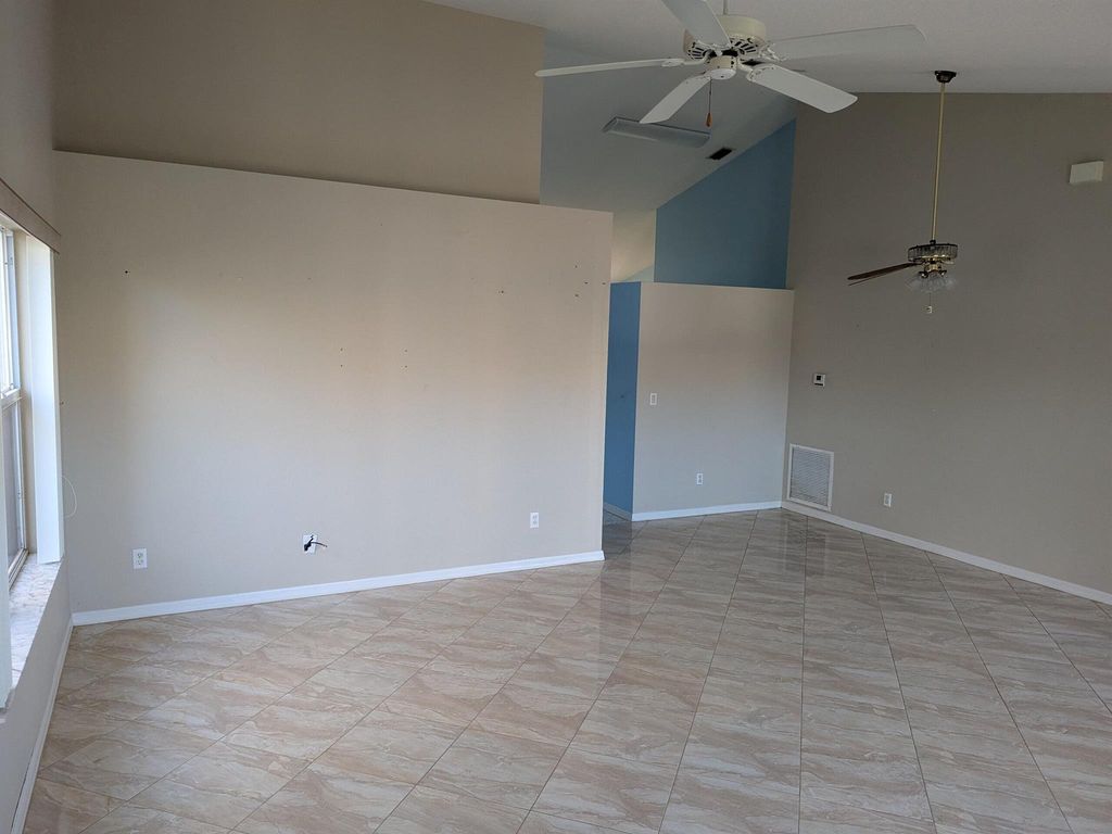 Photo of 375 NW Sherry Lane, Port Saint Lucie, FL 34986 (MLS # R11121165)