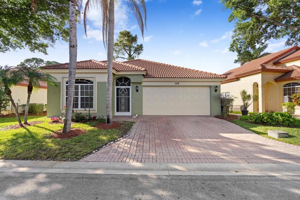 Photo of 5118 Elpine Way, Riviera Beach, FL 33418 (MLS # R10705417)