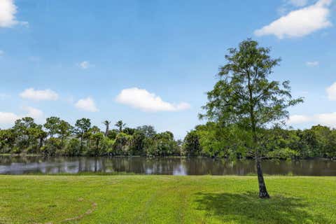 Photo of 9810 SW Eastbrook Circle, Port Saint Lucie, FL 34987 (MLS # B26056855)