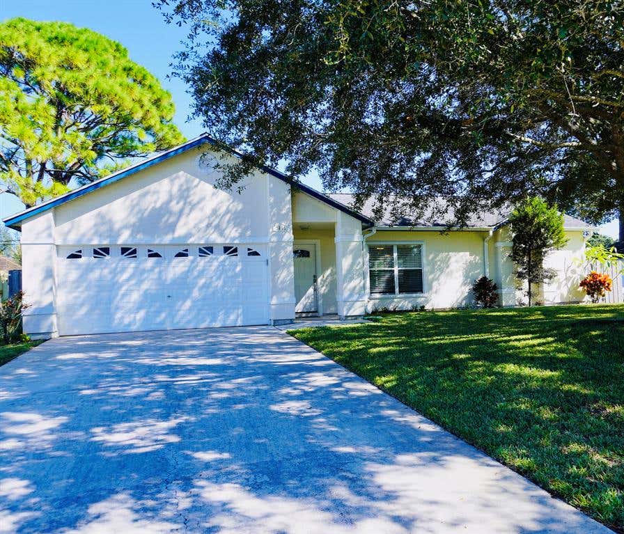Photo of 2051 SW Greenan Lane, Port Saint Lucie, FL 34953 (MLS # R10760119)