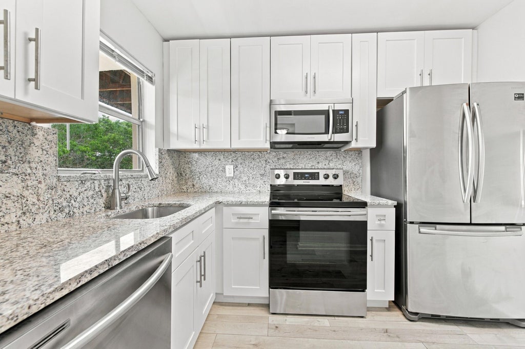 Photo of 8841 SUNRISE LAKES Boulevard #304, Sunrise, FL 33322 (MLS # B26076681)