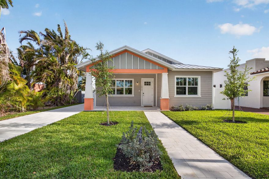 Welcome to 1017 Ardmore Road—an exceptional NEW CONSTRUCTION residence offering the perfect balance of a private tropical retreat and sophisticated contemporary design. Expertly crafted with superior attention to detail, this custom-built CBS home presents a rare opportunity to experience the very best of South Florida living.  This stunning single-story home features 3 spacious bedrooms, 2 beautifully appointed baths, and a resort-style pool and spa, complemented by a detached 1-bedroom, 1-bath guest house—ideal for hosting guests or creating a private sanctuary. Situated in one of West Palm Beach's most desirable locations, the home is enhanced by a sleek metal roof, hurricane impact windows and doors, and an expansive Travertine driveway and pool deck, all surrounded by manicured  landscaping. Upon entry, you're welcomed into a light-filled, open-concept living space defined by soaring ceilings, engineered hardwood flooring, and seamless indoor-outdoor flow. The gourmet kitchen is both striking and functional, showcasing custom wood cabinetry, exquisite Crystal Diamond porcelain countertops, an oversized island with designer pendant lighting, and a full suite of stainless steel appliances, including a built-in wine fridge and natural gas range. LED lighting throughout enhances the home's modern elegance, while the spacious laundry room features custom built-ins and an oversized front-load LG washer and dryer. The expansive primary suite offers a serene retreat, complete with a large walk-in closet and a spa-inspired ensuite bath appointed with elegant Carrara White quartz countertops. Two additional guest bedrooms and a beautifully designed guest bath complete the main residence. Step outside to your private backyard oasis—the true centerpiece of the home. A heated pool with sun shelf and spa is surrounded by an expansive Travertine deck, thoughtfully designed to create separation and privacy between the main house and the detached guest cottage. This versatile space offers endless possibilities, whether for extended family, guests, or a secluded personal retreat. Don't miss this rare opportunity to own a newly constructed, design-forward home in one of West Palm Beach's most sought-after neighborhoods.