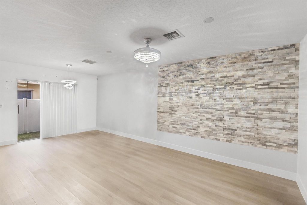 Photo of 176 SE 2nd Street SE, Deerfield Beach, FL 33441 (MLS # R11133208)