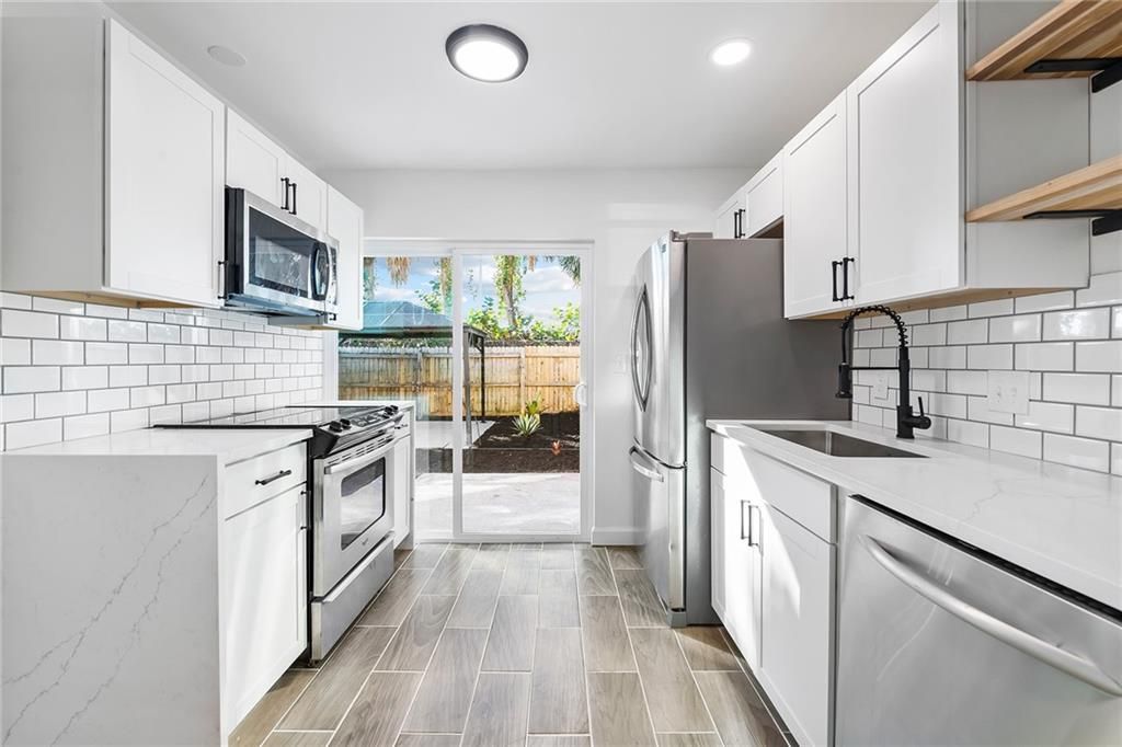 Photo of 4330 Lilac St #G, Palm Beach Gardens, FL 33410 (MLS # F10364712)