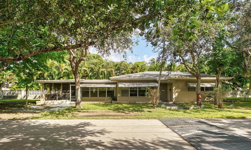 Prime opportunity in highly sought-after Lake Ridge! This southeast-facing corner lot offers a true investor or builder’s special in one of Fort Lauderdale’s fastest-growing neighborhoods, surrounded by new construction and modern homes. The property features 2 bedrooms, 2 bathrooms, and a Florida room with nearly 1,500 sq. ft. of living space. Highlights include terrazzo flooring throughout, a 2018 roof, natural gas available at the street, and irrigation from a private well. With solid structure and an unbeatable location just minutes from Downtown Las Olas and Fort Lauderdale Beach, this property is ideal for investors, developers, or anyone looking to renovate or build new in a prime area.