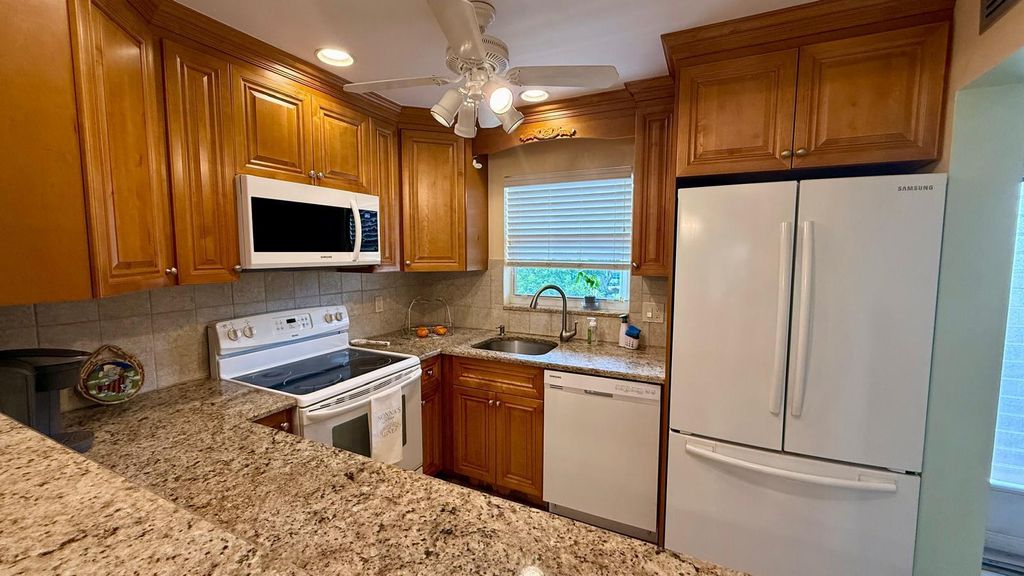 Photo of 705 Lori Drive #309, Palm Springs, FL 33461 (MLS # R11146926)