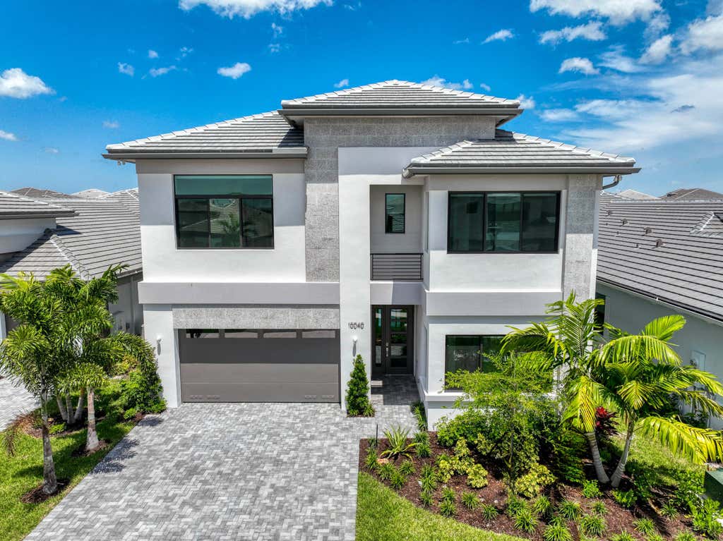 Photo of 10040 Heron Flock Drive, Palm Beach Gardens, FL 33412 (MLS # R11060898)