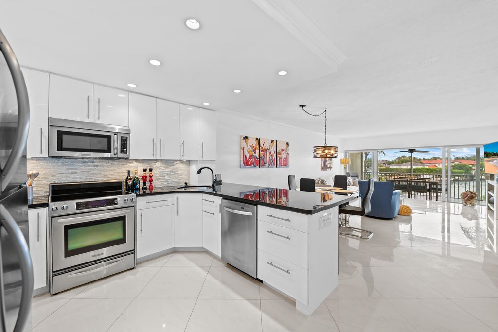 Photo of 400 N Federal Highway #315, Deerfield Beach, FL 33441 (MLS # B26013686)