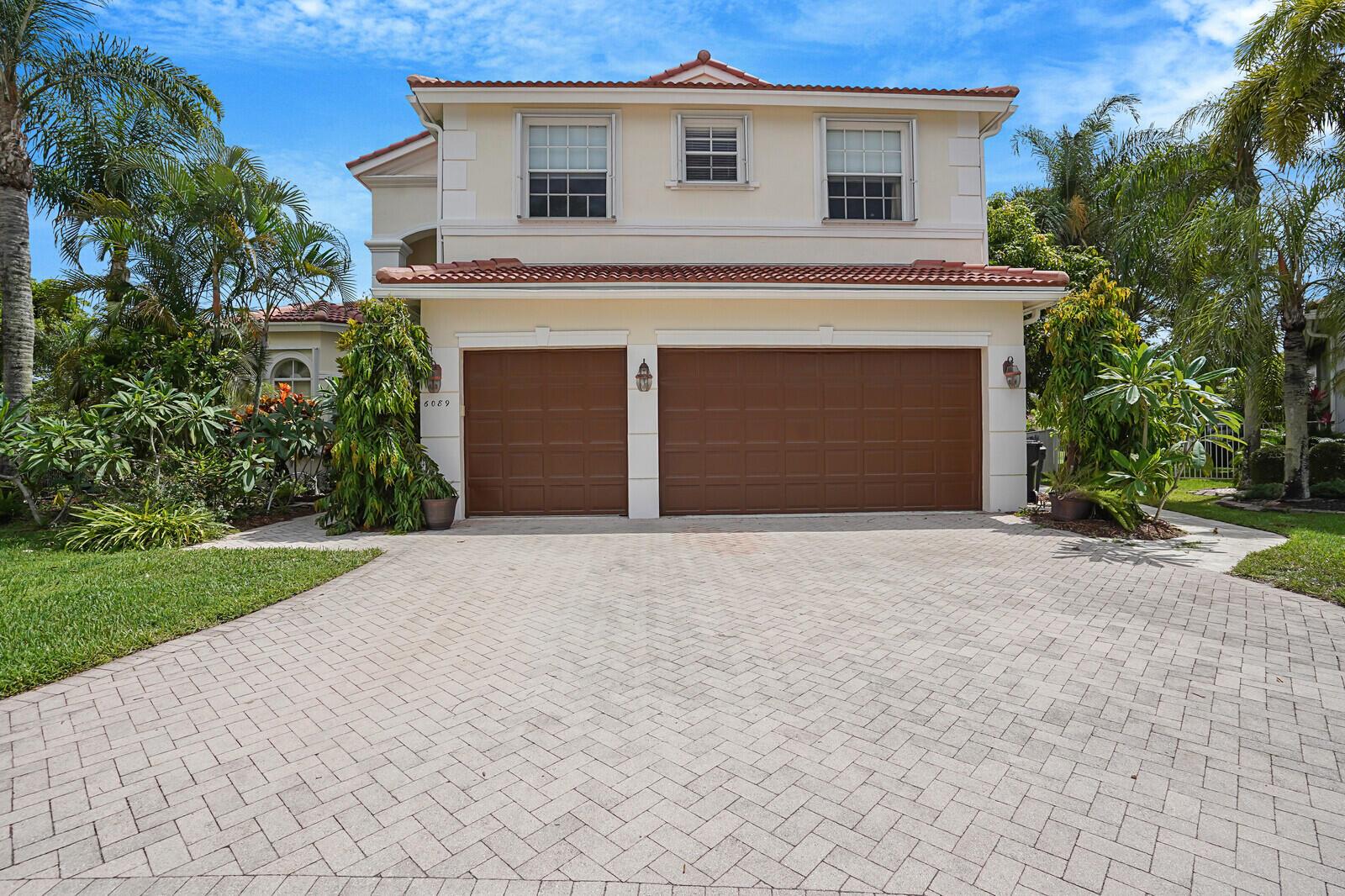 Live the South Florida lifestyle in this impressive, true 6-bedroom, 4.5-bath lakefront pool home on an oversized pie-shaped lot at the end of a cul-de-sac--one of the best values in Palm Beach! Available as an unfurnished annual rental, this spacious residence boasts nearly 3,700 sq ft under air and offers both privacy and stunning panoramic lake views. The irrigation system pulls directly from the lake, helping maintain the lush, vibrant landscape.Enjoy a private screened pool with child safety fencing and a covered patio--ideal for relaxing or entertaining. Inside, you'll find wood laminate flooring, plantation shutters throughout, crown molding, and fresh interior/exterior paint.