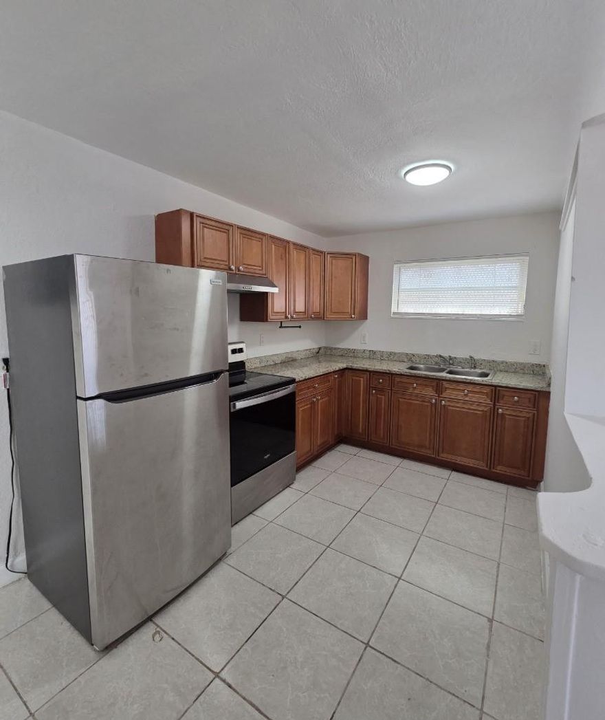End of year Special! 1 MONTH FREE RENT.

NO HOA, move FAST—lease by 12/31/25 and enjoy one month of FREE rent in Fort Lauderdale! 1st and security for qualified months.

Step into this tranquil corner unit, offering roomy living with 3 spacious bedrooms and 2 full baths. The freshly painted interior features a modern kitchen with refrigerator and stove, plus convenient washer/dryer inside unit. Enjoy the ease of private front-door parking and the added outdoor space of a gated backyard. With quick access to schools and major highways, this home combines comfort, privacy, and practicality. Don’t wait—schedule your tour today!