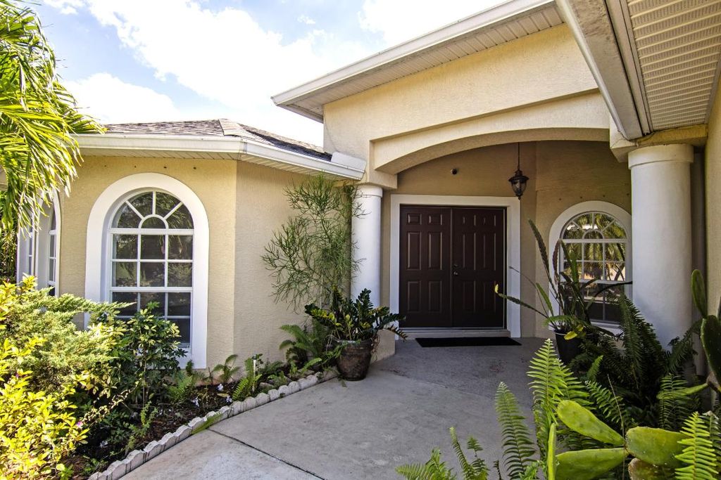 Photo of 1522 SW Medley Lane, Port Saint Lucie, FL 34953 (MLS # R11133632)