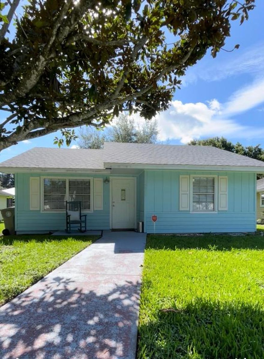 SHORT SALE! Lovely home located in the Paradise Park neighborhood of Vero Beach. Bright and cozy interior with a 2023 roof. Samsung kitchen appliances, 2023 Samsung front-load washer, and 2023 LG front-load dryer included. 75 cu. ft. horizontal storage shed on site. Home needs some TLC, offering a great opportunity to add personal touches.