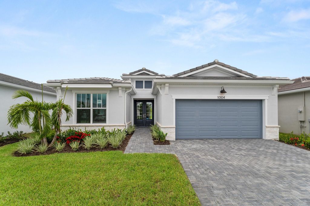 Photo of 10104 SW Carnelian Street, Port Saint Lucie, FL 34987 (MLS # R11109622)