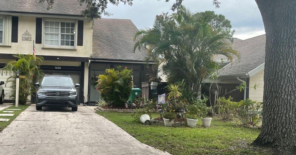 Photo of 1325 SE Rivergreen Circle, Port St Lucie, FL 34952 (MLS # R10907523)