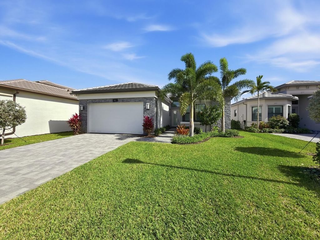 Photo of 9651 Spruce Woods Drive, Boynton Beach, FL 33473 (MLS # R11154072)