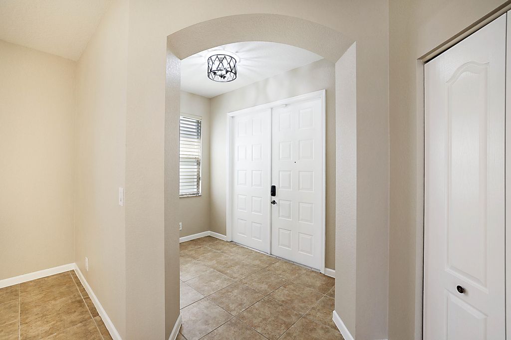 Photo of 122 Kensington Way, Royal Palm Beach, FL 33414 (MLS # B26015832)