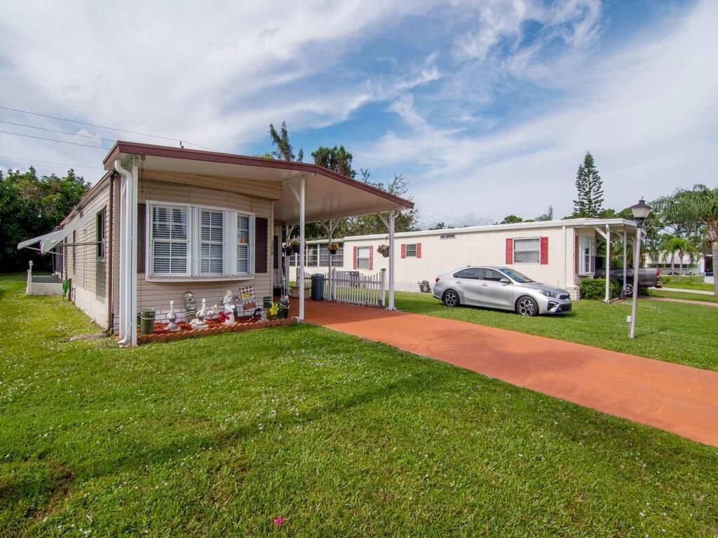 Photo of 208 W West Caribbean, Port Saint Lucie, FL 34952 (MLS # R10927501)