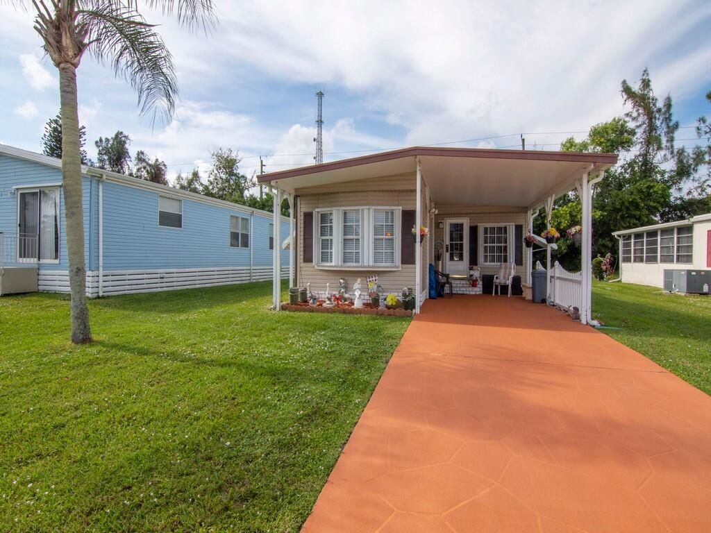 Photo of 208 W West Caribbean, Port Saint Lucie, FL 34952 (MLS # R10927501)