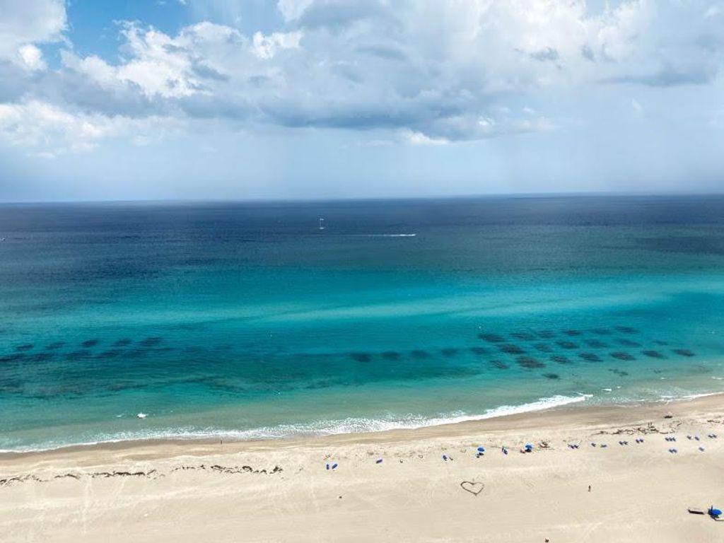 Photo of 3000 N Ocean Drive #30-C, Singer Island, FL 33404 (MLS # R10975384)