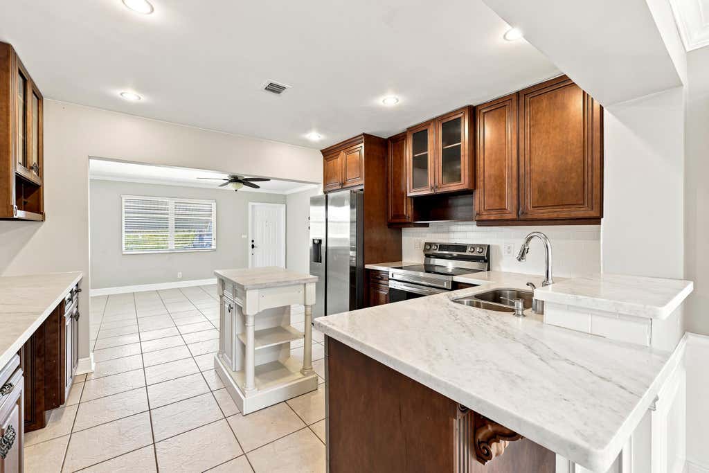 Photo of 4569 NW 16th Avenue, Tamarac, FL 33309 (MLS # B26050147)