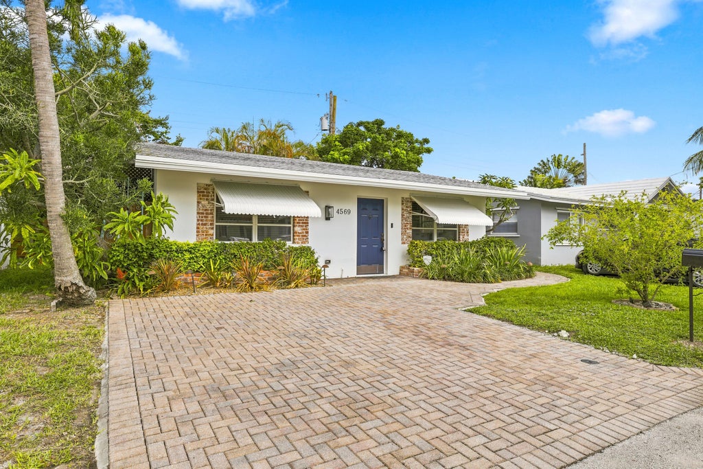 Photo of 4569 NW 16th Avenue, Tamarac, FL 33309 (MLS # B26050147)