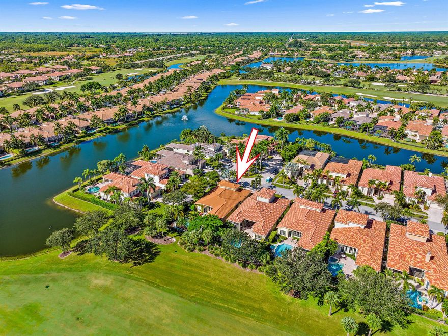 Beautifully situated on Ibis's Nicklaus-designed Tradition #7, this move-in perfect, CUL-DE-SAC,  home offers luxury, convenience and a premium location. Substantial structural upgrades  throughout this Sabatello-built 3BR/3.5BA+Den including: NEW ROOF (2019), NEW IMPACT GLASS (2021) WHOLE-HOUSE GENERATOR (2020) and SALT-WATER pool system (2022.) Soaring ceilings, architectural drama, and large open rooms characterize the widely sought-after ''Balfour'' floor plan. Featuring wide golf view, with serene lake views to the south, this east-facing home features a spacious back yard, a large screened-in and covered lanai--perfect for outdoor relaxation or dining. The backyard landscaping was completely reimagined in 2023, maximizing the golf and water vistas of Tradition #7. In 2022, the heated pool and spa was refurbished with a new heater, and was converted to a saltwater system-- a Jandy remote control system was also installed. Enjoy the firepit, outdoor Sonos system and SWAT mosquito abatement system for ideal Florida outdoor living. Inside, the dramatic vaulted ceiling in the oversized foyer will wow you, as will the box-beam ceiling detail in the over-sized living room. The kitchen graciously opens to the spacious family room. Neutral tones, designer light-fixtures and window treatments enhance the understated contemporary elegance of this beautifully upgraded home. Other highlights include: Family room built-in, NEW Washer and Dryer (2020), NEW Dishwasher, Central Vac and more.