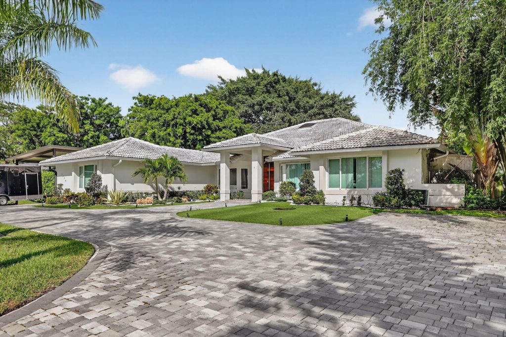 Photo of 5928 NW 77th Terrace, Parkland, FL 33067 (MLS # F10550064)