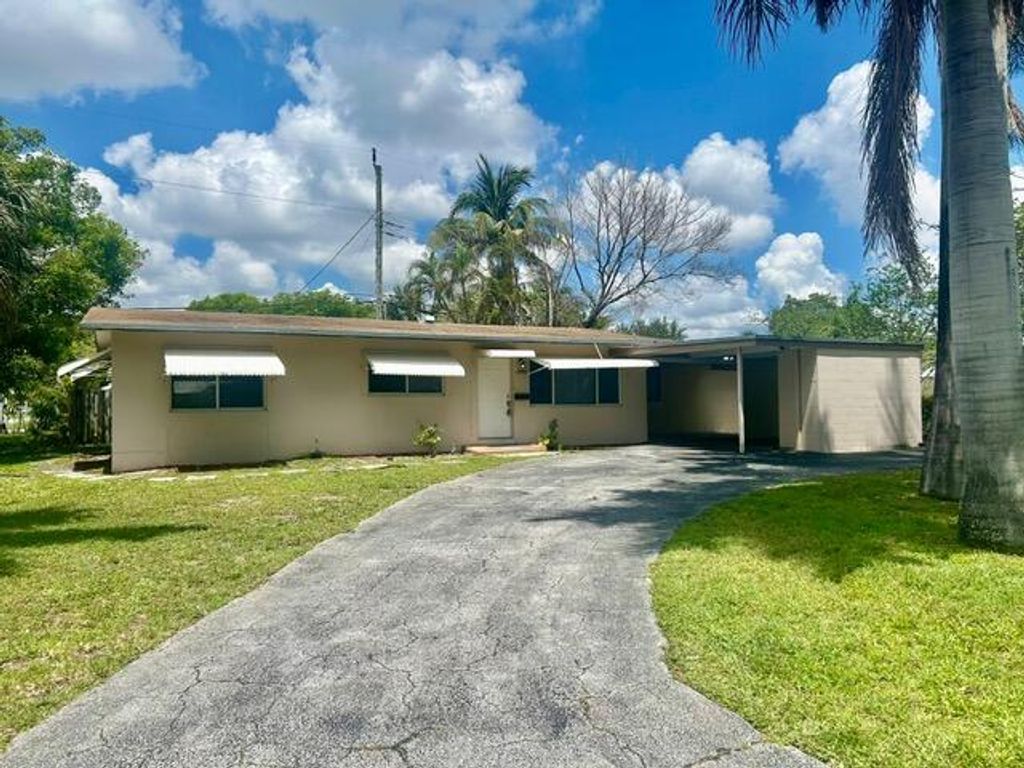 Photo of 1201 NE 26th Terrace, Pompano Beach, FL 33062 (MLS # B26030142)