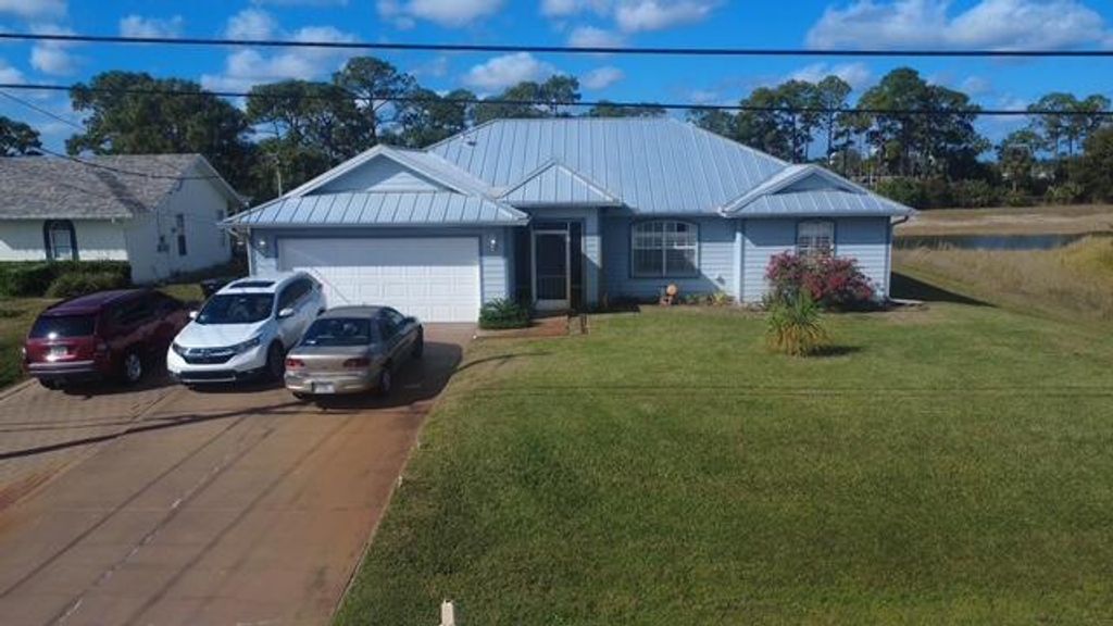 Photo of 2366 SW Alminar Street, Port Saint Lucie, FL 34953 (MLS # R11161990)