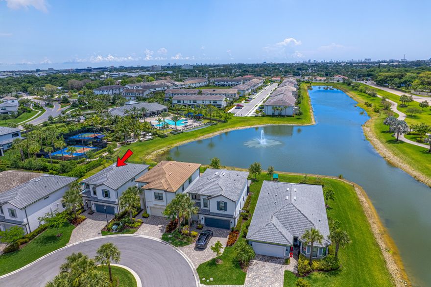 Welcome to this lakefront home set on a quiet cul-de-sac within the gated Oak Tree community! High ceilings bring in natural light and give this two-story, 3-bedroom, 2.5-bath home an open, airy feel. The kitchen features quartz countertops, stainless steel appliances, a large island, and a walk-in pantry. Upstairs includes a spacious loft and laundry room. The primary suite includes a walk-in closet and oversized glass shower. There's storage throughout, including in the garage, with overhead storage and built-in cabinetry. Impact windows & doors. 2022 build. Screened patio w/lake & fountain views. Oak Tree's amenities include a heated pool, fitness center, pickleball courts, dog park, hammocks, and clubhouse. HOA includes landscaping & high-speed internet for a low-maintenance lifestyle.