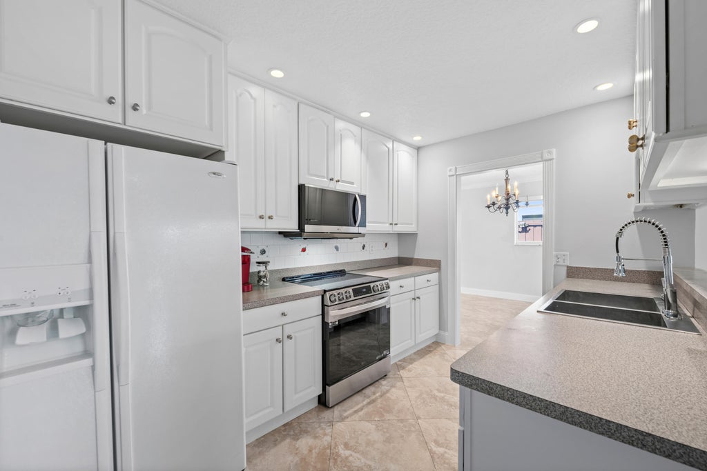 Photo of 3291 NW 63RD Street, Fort Lauderdale, FL 33309 (MLS # B26069777)