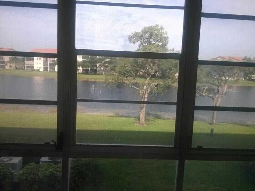 LAKEFRONT 2/2 ON THE NEWER SIDE OF CENTURY VILLAGE--POOL RIGHT ACROSS FROM BUILDING---WALK TO CLUBHOUSE---ALL TILED FLOORS--ENCLOSED BALCONY WITH BUILT IN STORAGE CLOSET OVERLOOKING THE LAKE--WALK TO PLACE OF WORSHIP---show credit score----