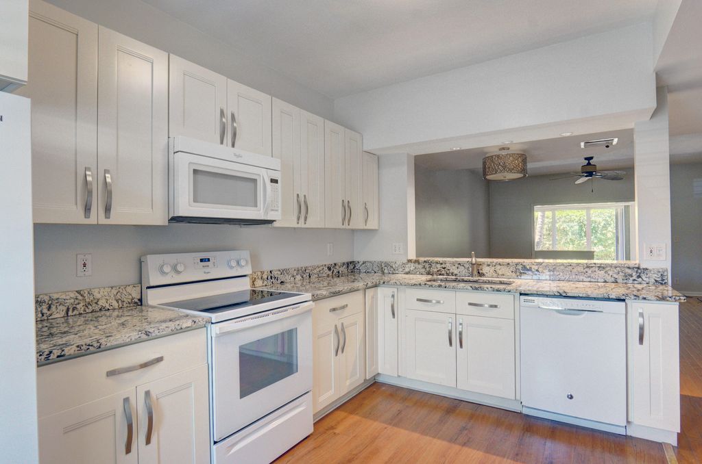 Photo of 941 Kokomo Key Lane, Delray Beach, FL 33483 (MLS # R10984870)